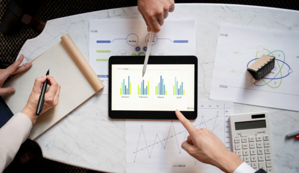 top-view-business-people-working-with-ipad